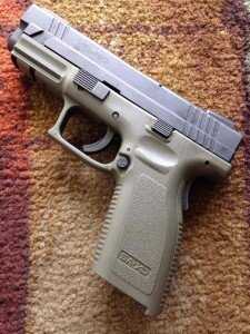 The original XD grip had issues that some have sought to solve through customization. 