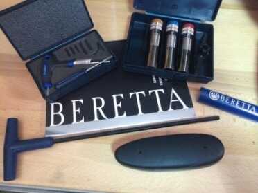 A Beautiful Beretta: The New 692 Sporting B-Fast Over/Under Shotgun Some of the accessories that come packaged with the 692 Sporting.