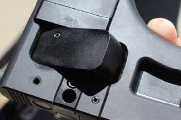 Push this lever and the stock slides in and out.