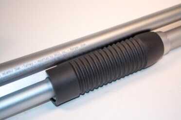 10 Things to Look For In A SHTF Shotgun The forend is matching black plastic with ridges molded for improved grip.
