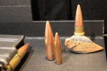 Next to a .30 Caliber bullet. 