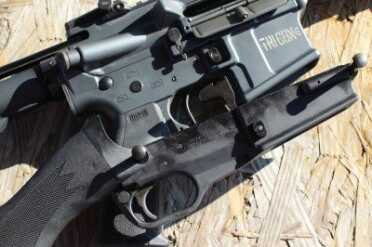 50 State Legal AR-15 - Ares Defense SCR The SCR lower next to an "normal" AR. Note how much smaller it is. Also, the location of the trigger and safety.