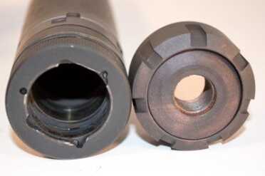 A Look at SilencerCo's Saker 556 Suppressor The Trifecta MAAD Mount (installed) and the direct thread MAAD mount (right)