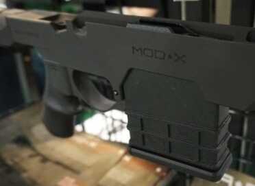 The Mod*X from A*B Arms--SHOT Show 2015 Taking picutres at SHOT is always a challange, but the effort is made more difficult by odd lighting and flat black on dark backgrounds.
