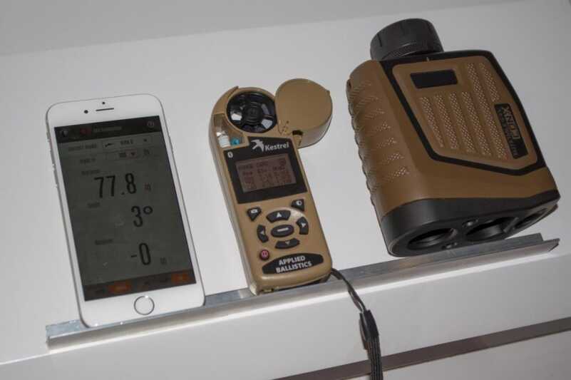 Bushnell Takes The Guesswork Out of Long-Range Shooting Bushnell's ARC CONX (right) shown with Kestrel meter and smartphone app.