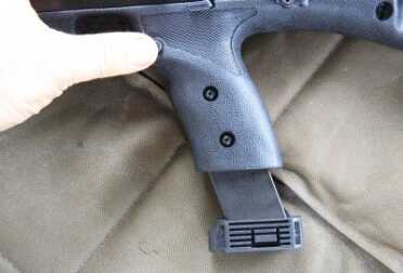 Cheap Guns: Hi-Point 45ACP Tactical Carbine - 4595TS Review The magazine doesn't want to go in with just a slap. You have to depress the mag release to get the mag in.