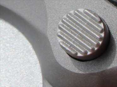There it is. The mold line of a MIM part on the magazine release.
