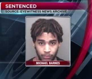 What kind of dingbat gives their baby a gun and then films them acting unsafely with it?  (Photo: Vanderburgh County Jail)