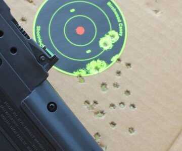 25 yards, standing. The light weight of the gun makes it very easy to hold. 