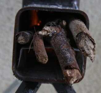 Prepping 101: Cheap & Small DIY Rocket Stove Cooking This stove had directions that said use pencil thick sticks. I used a few sizes that fit.
