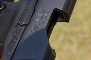 The ejection port is wide enough to throw the empty cases free.