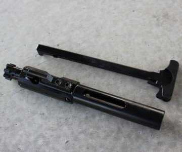 CMMG's 7.62x39 AR--The Mutant--Review The bolt is a shortened AR-10 style bolt.