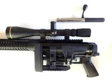 The New Ruger Precision Rifle--Everything Done Right? The stock fold release is easy to use on the left side and the oval button on the upper side of receiver is easy to access. The stock needs to fold to remove the bolt.