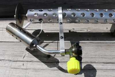 The pilot light takes a 8.5 ounce can of butane. These aren't easy to find in under-stocked areas. 