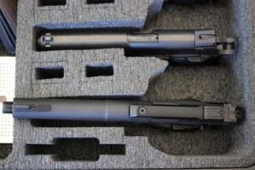 The pistol case is meant for full sized guns, but not crazy long pistols like this Buckmark.