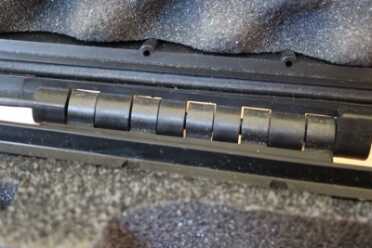 Steel hinge pins inside polymer. Hinges are one of the first points to break on a case. 