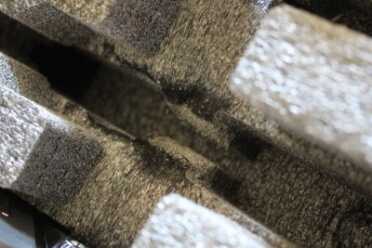 The closed cell foam compresses to the shape of the gun very well.