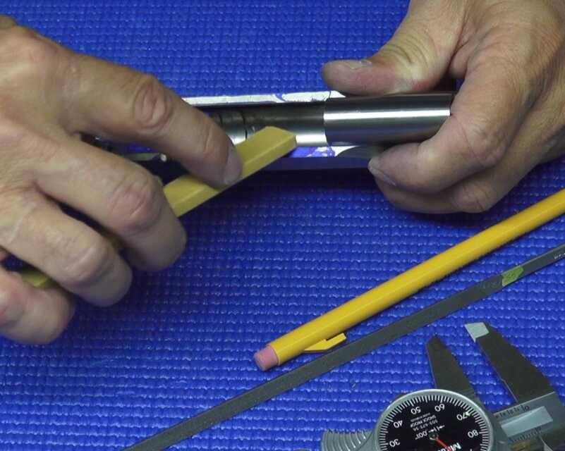 Hand Building a Custom 1911 (The Bob Marvel Way) Early steps include lightly dressing the key surfaces and ensuring a burr-free surface.