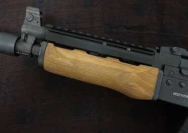 The Ultimak railed tube allows for red dots that can co-witness with the sights.