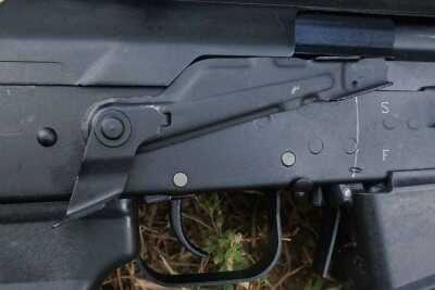 The safety is an AK safety, like it or not. But the thumb ledge helps keep your right hand on the grip.