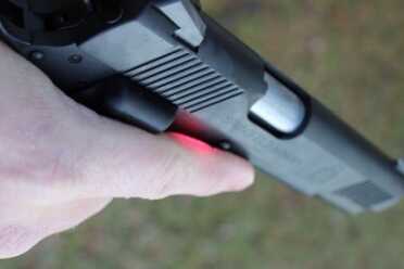 I tend to block the laser with my trigger finger when keeping it off the trigger. Training would cure this if I was going to use this as an EDC. 