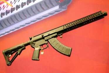The longer rifle form with the new muzzle device. 