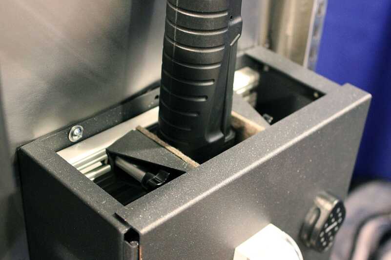 BoomDock--Rapid Access for Long Guns--SHOT Show 2016 The boxes are built of 14 gauge steel and have plates (not shown) that cover the open gape on the top and bottom.