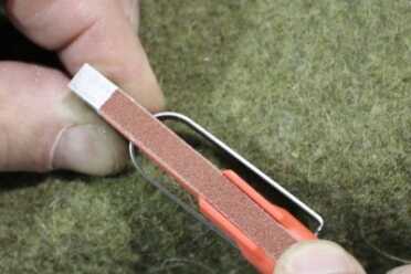 Material being removed from top of trigger.