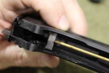 Rear of trigger bow bent. 