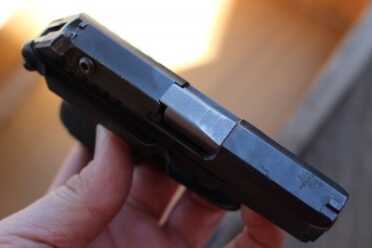 Kel-Tec P3AT--3 Year Review A bit of wear on top of the barrel.