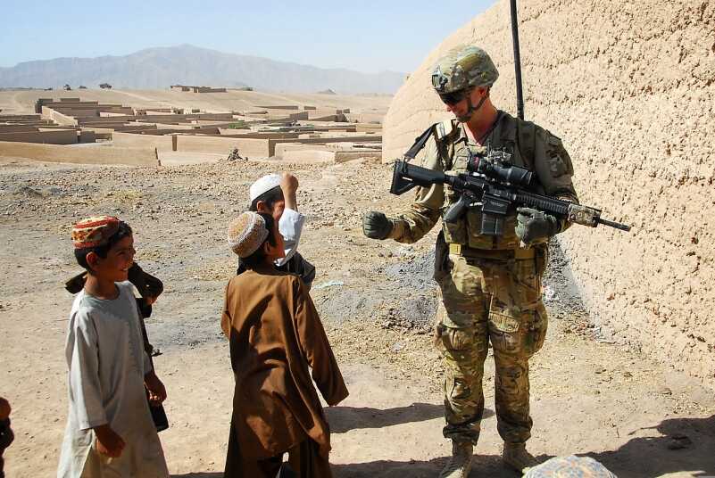 Australian Army Pvt. Levi Mooney and his Heckler &amp; Koch rifle in Afghanistan. (Photo: Sgt. Jessi Ann McCormick) sniper rifle