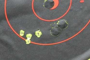 Henry's .22 Magnum Small Game Exterminators Five shots from the bench at 50 yards.