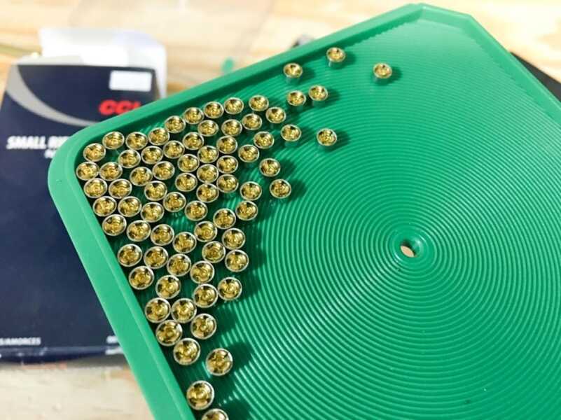 The feeding tray of hand priming tools has ridges so a gentle "swirl" will cause the primers to orient bottom down so they're ready to feed. 