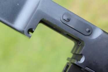 The slots are for a drum mag. 