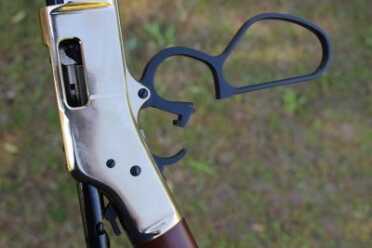 The not so new, but newer than the original brass framed Henry, action open. 