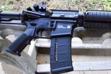 FN Military Collector Series M4—True Mil-Spec 5.56 Carbine! Full Review Apart from being semi-auto and having a permanently attached muzzle device, this M4 is hard to distinguish from a true military carbine.