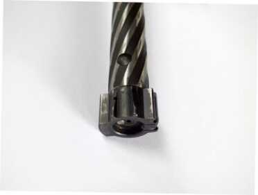 The two piece bolt has two wings on the bottom to pick up rounds from either side of the staggered box magazine.