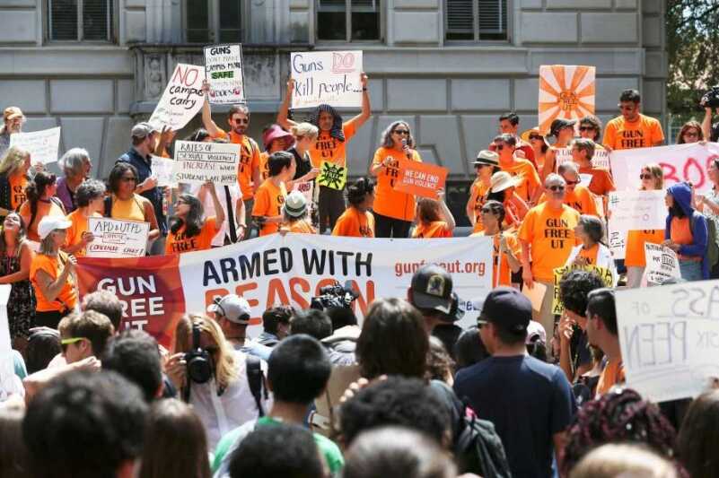 ‘Cocks Not Glocks’ Hands Out Dildos to Protest Campus Carry in Texas (Photo: Tom Reel, San Antonio Express News)