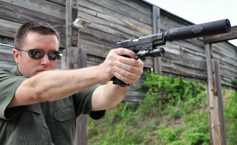 The Nighthawk GRP Recon is designed to provide shooters with a tactical-grade 1911 capable of accepting weaponlights such as this Surefire X300 Ultra. 