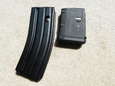 Mossberg MMR AR-15 New M-Lok & Sub MOA - Full Review A 30-round metal magazine comes with the gun. This Magpul 10-rounder also worked well as did a Bushmaster mag.