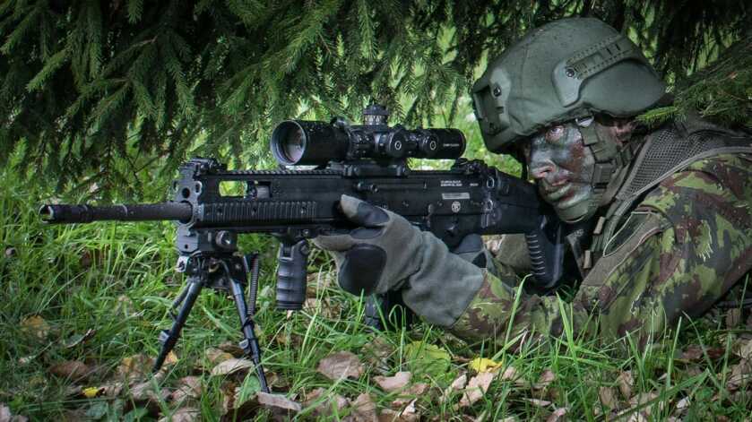 FN SCAR military rifle representing international adoption of the SCAR platform