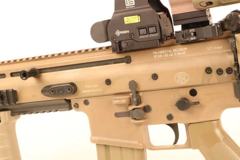 Original FN SCAR reciprocating charging handle shown on the review rifle