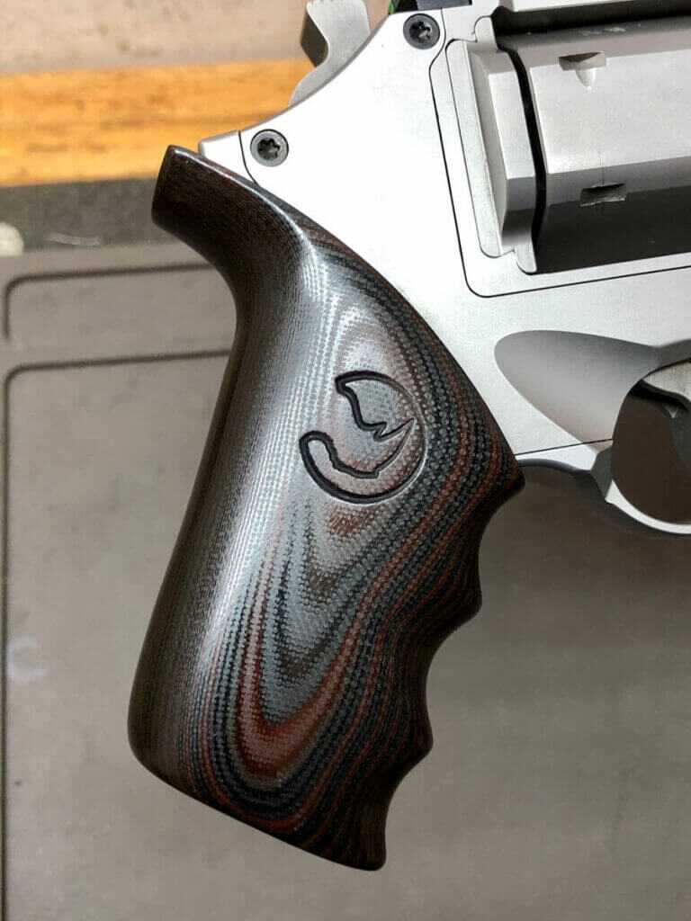The Unique Chiappa Rhino Chiappa 30DS X revolver on a wooden table, symbolizing the blend of classic design with modern shooting innovation.