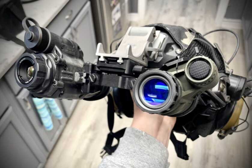 Side by side N-Vision NOX18 thermal monocular and Nocturn Industries Tanto UANVM comparison on desk