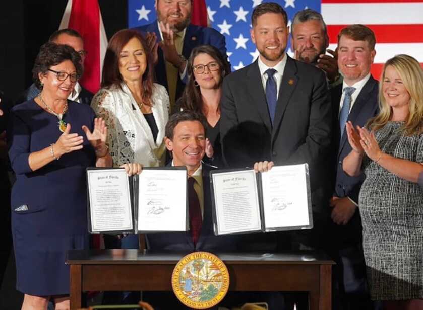Gov. Rob DeSantis during the signing.