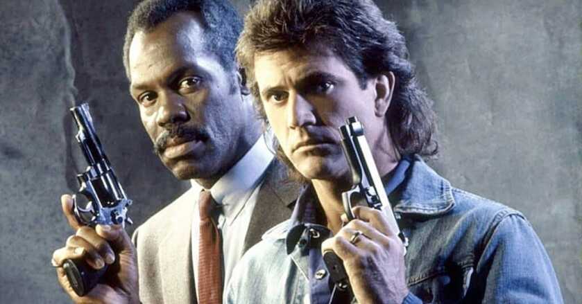 two guys holding pistols from Lethal Weapon movie