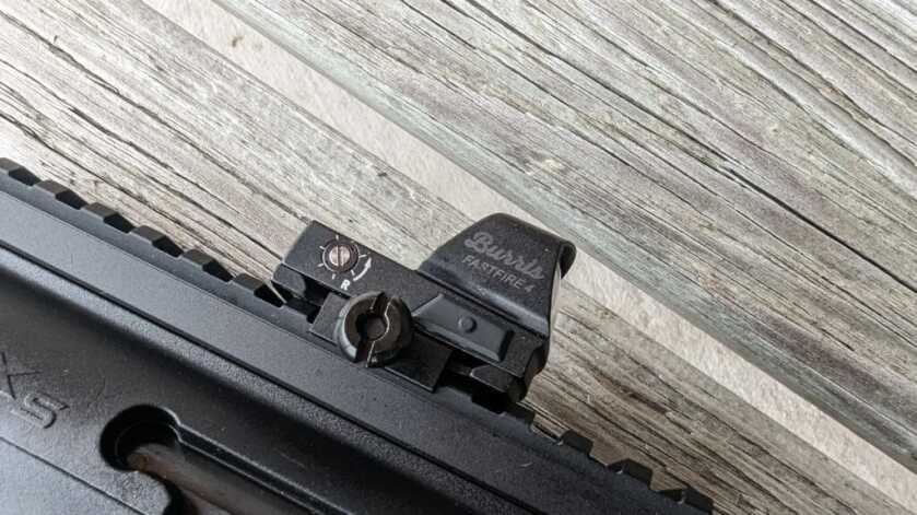 2 - The Fastfire 4 - Budget Blasting Red Dot Fastfire 4 against hardwood backdrop