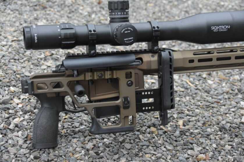 A closeup view of the folding rifle stock.