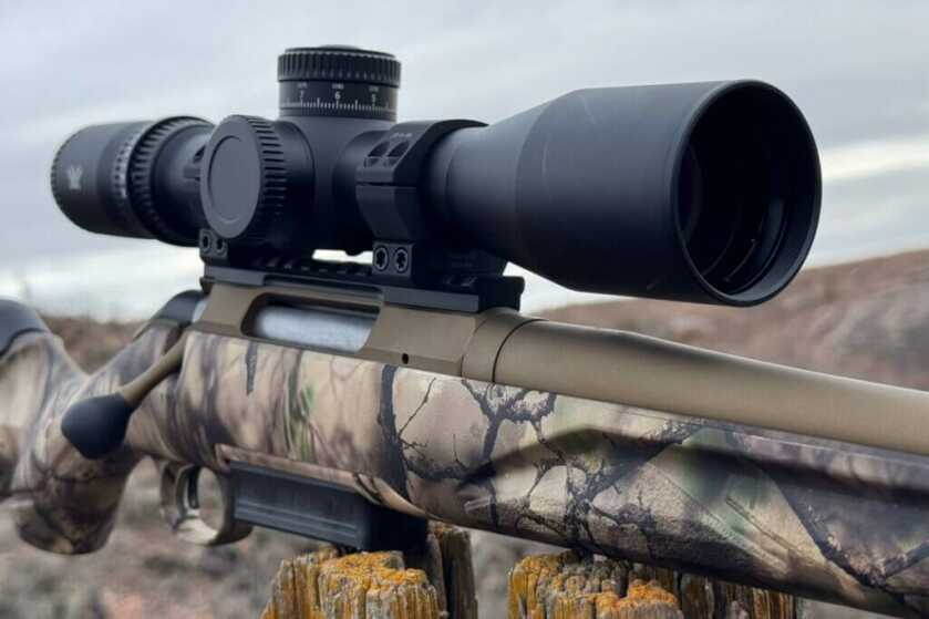 The Vortex Venom 3-15 scope mounted on a camo rifle