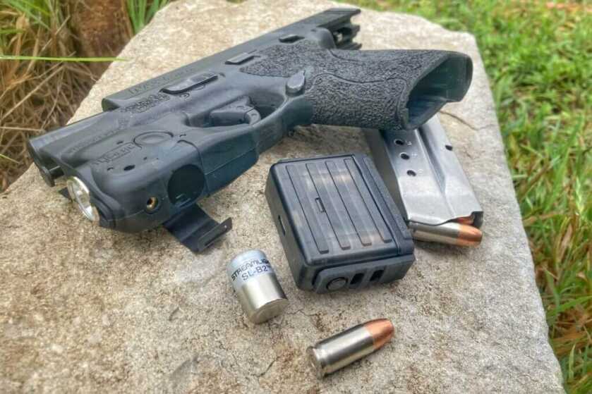 Battery swap for weapon-mounted light with magazine, ammo, and handgun
